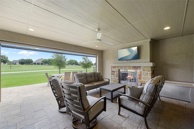 9921 Flint Way, Denton, TX 76207 - view of patio with an outdoor living space with a fireplace