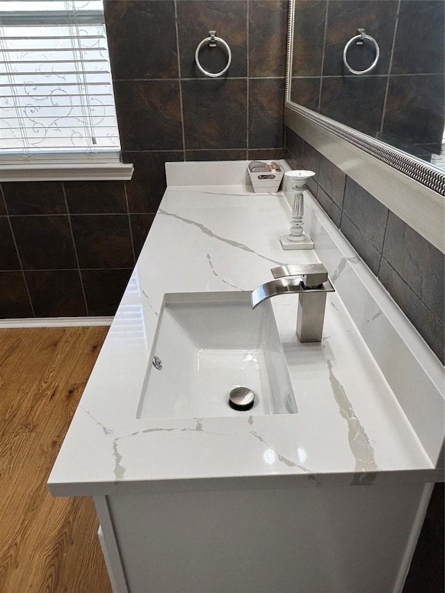 4026 Red Rock Dr, Heartland, TX 75126 - bathroom with wood finished floors and vanity