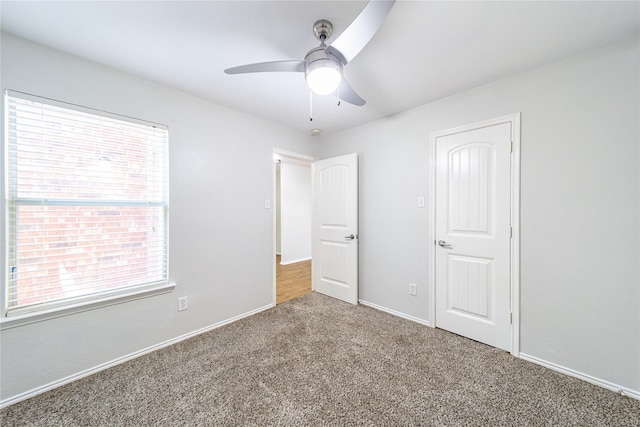 4026 Red Rock Dr, Heartland, TX 75126 - unfurnished bedroom with carpet floors, baseboards, and ceiling fan