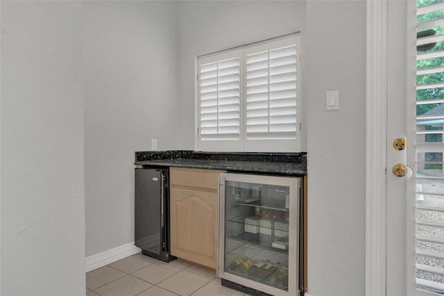 732 Richmond Ln, Keller, TX 76248 - indoor dry bar featuring wine cooler, light tile patterned flooring, and baseboards