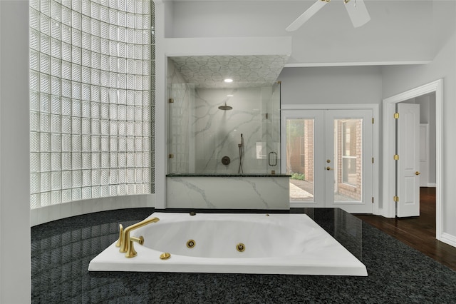 732 Richmond Ln, Keller, TX 76248 - full bath featuring a marble finish shower, a whirlpool tub, french doors, wood finished floors, and a ceiling fan