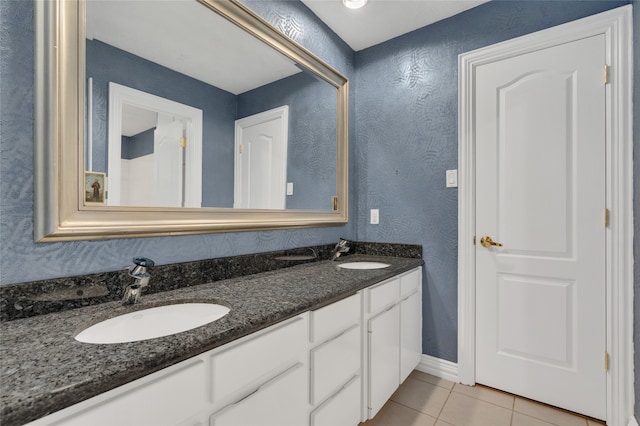 732 Richmond Ln, Keller, TX 76248 - bathroom featuring double vanity, tile patterned floors, and baseboards