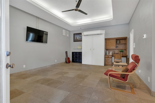 732 Richmond Ln, Keller, TX 76248 - sitting room featuring a ceiling fan, a raised ceiling, baseboards, and a wall unit AC