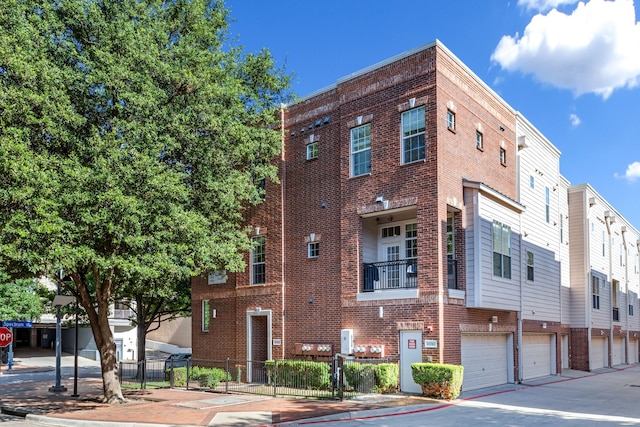15763 Spectrum Dr Unit 93, Addison, TX 75001 - view of building exterior featuring an attached garage