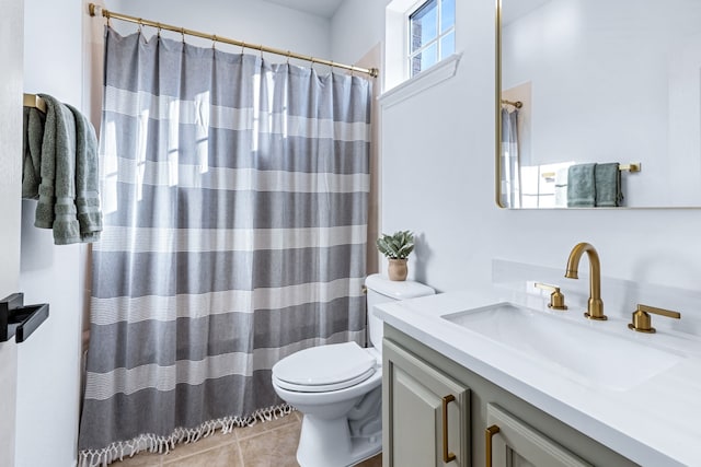 15763 Spectrum Dr Unit 93, Addison, TX 75001 - bathroom with vanity, toilet, tile patterned floors, and curtained shower