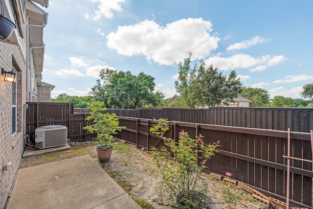 4651 Penelope Ln, Plano, TX 75024 - fenced backyard with a patio and central AC unit