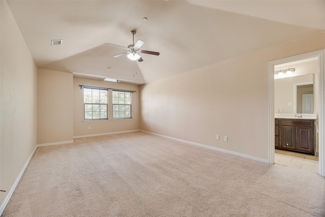 4651 Penelope Ln, Plano, TX 75024 - spare room with a ceiling fan, light carpet, lofted ceiling, a sink, and baseboards