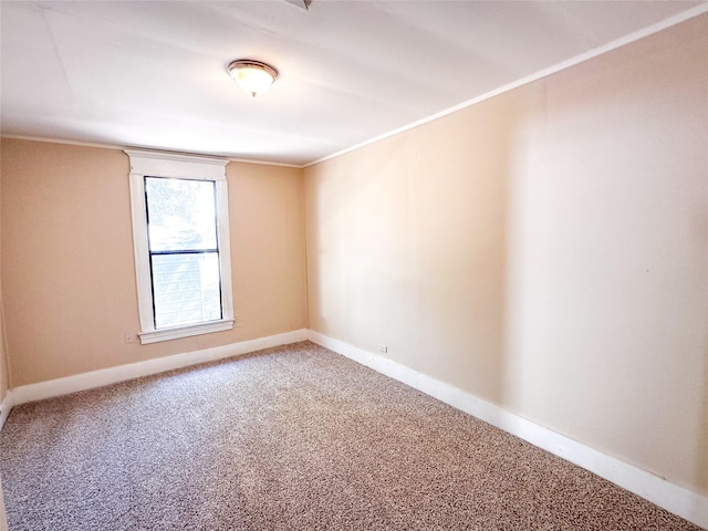 611 4th St, Mineral Wells, TX 76067 - carpeted empty room with crown molding and baseboards