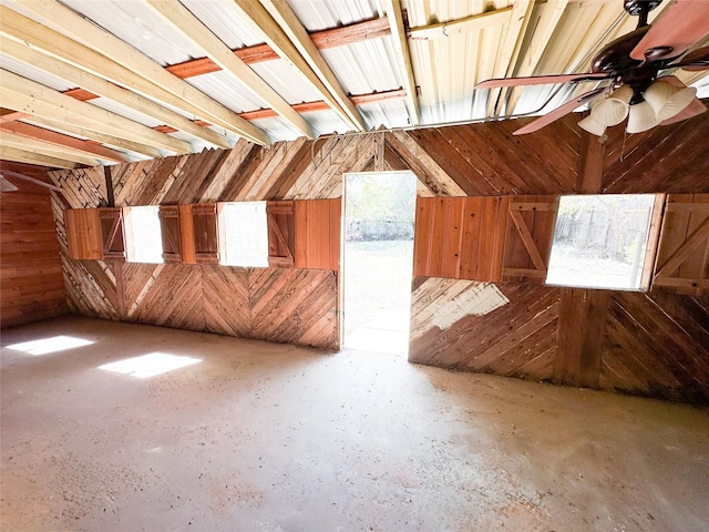 611 4th St, Mineral Wells, TX 76067 - additional living space with plenty of natural light, a ceiling fan, and wood walls