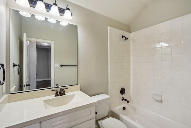 9617 Rexford, Fort Worth, TX 76131 - full bathroom featuring toilet, vanity, bathtub / shower combination, and vaulted ceiling