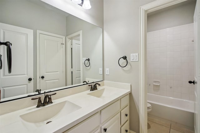 9617 Rexford, Fort Worth, TX 76131 - bathroom with double vanity, toilet, tile patterned floors, and tub / shower combination
