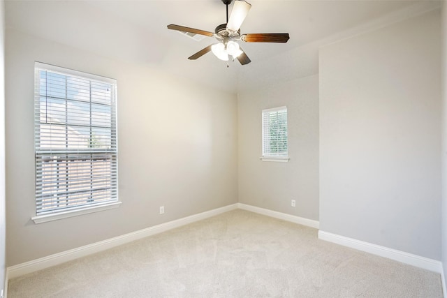 9617 Rexford, Fort Worth, TX 76131 - unfurnished room featuring light colored carpet, baseboards, and a ceiling fan