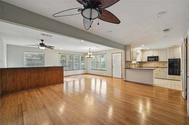 5702 Stage Line Ct, Arlington, TX 76017 - unfurnished living room with ceiling fan, light wood-style flooring, and recessed lighting