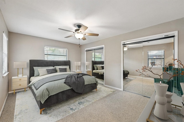 5702 Stage Line Ct, Arlington, TX 76017 - bedroom with two closets, carpet flooring, and a ceiling fan