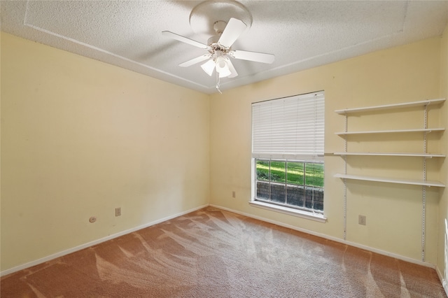 5702 Stage Line Ct, Arlington, TX 76017 - carpeted spare room with a textured ceiling and a ceiling fan