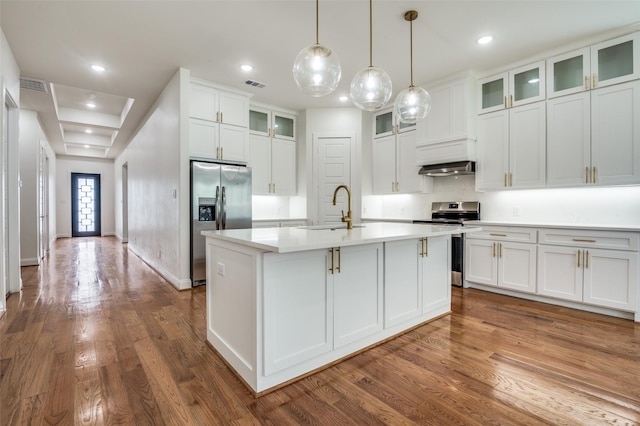 319 Bounding Main St, Gun Barrel City, TX 75156 - kitchen with a sink, stainless steel appliances, a center island with sink, dark wood-type flooring, and recessed lighting
