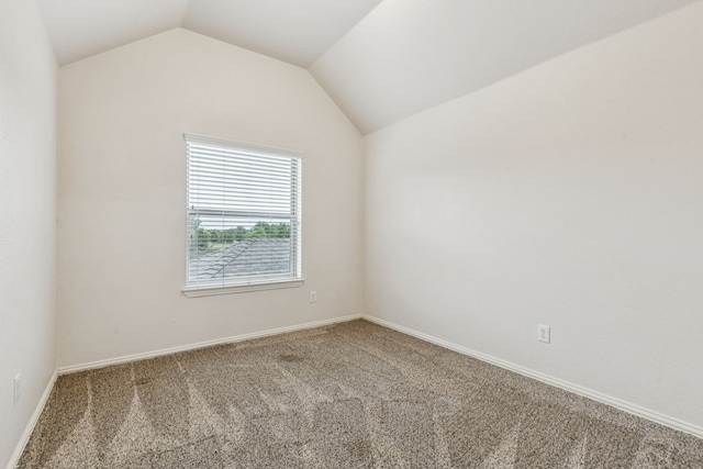 1702 Travis Ct, Allen, TX 75002 - unfurnished room featuring carpet floors, lofted ceiling, and baseboards