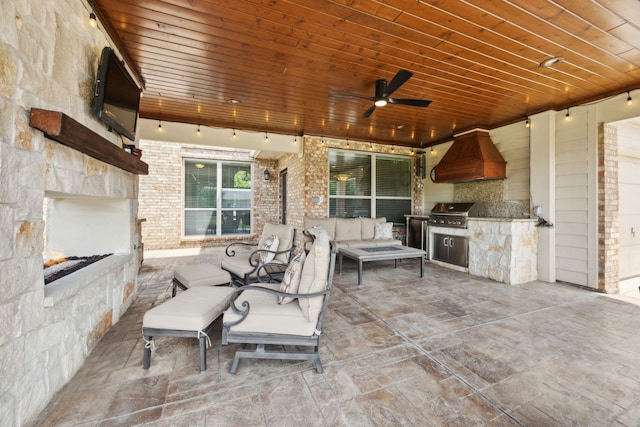 1702 Travis Ct, Allen, TX 75002 - view of patio / terrace featuring a lit fireplace and a ceiling fan