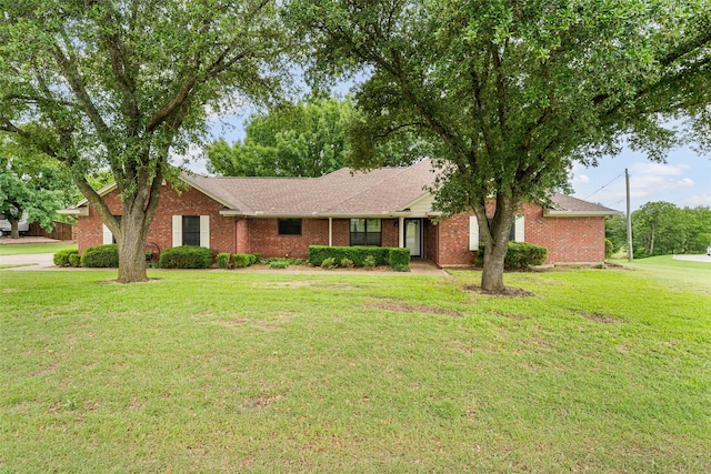 137 Thiele Rd, Lorena, TX 76655 - ranch-style home featuring a front yard, brick siding, and a shingled roof