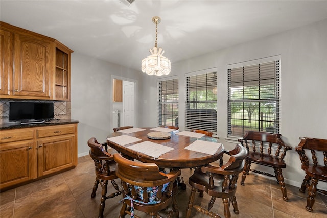 137 Thiele Rd, Lorena, TX 76655 - tiled dining room featuring baseboards and a chandelier