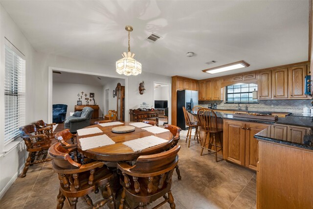 137 Thiele Rd, Lorena, TX 76655 - dining area featuring a chandelier and baseboards