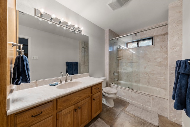 137 Thiele Rd, Lorena, TX 76655 - full bath with toilet, vanity, shower / bath combination with glass door, and tile patterned floors