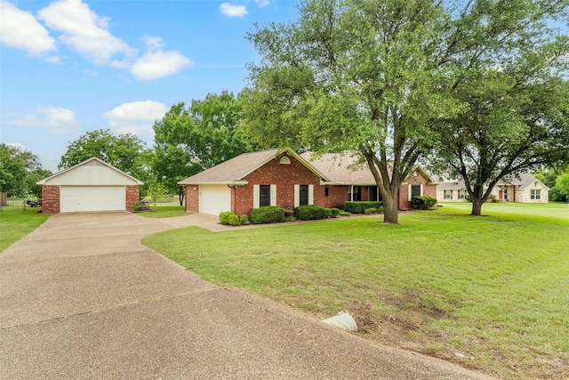 137 Thiele Rd, Lorena, TX 76655 - view of front of house featuring a detached garage, brick siding, a front lawn, and roof with shingles