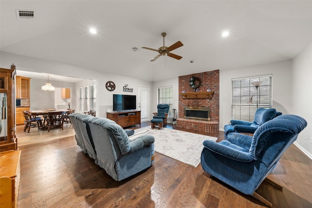 137 Thiele Rd, Lorena, TX 76655 - living room with vaulted ceiling, a fireplace, wood finished floors, ceiling fan, and recessed lighting