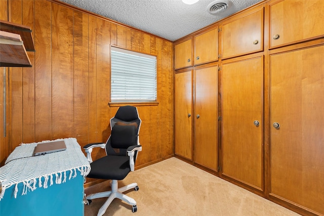 5 Scott Pl, Abilene, TX 79601 - carpeted home office with wood walls and a textured ceiling
