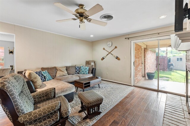 5 Scott Pl, Abilene, TX 79601 - living room with crown molding, wood finished floors, ceiling fan, and baseboards