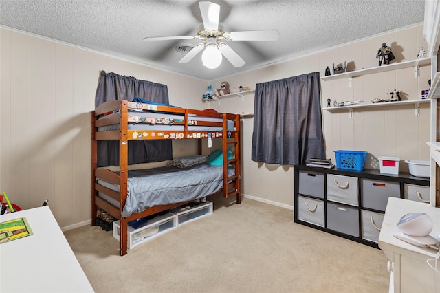 5 Scott Pl, Abilene, TX 79601 - bedroom featuring a textured ceiling, light carpet, baseboards, and ceiling fan