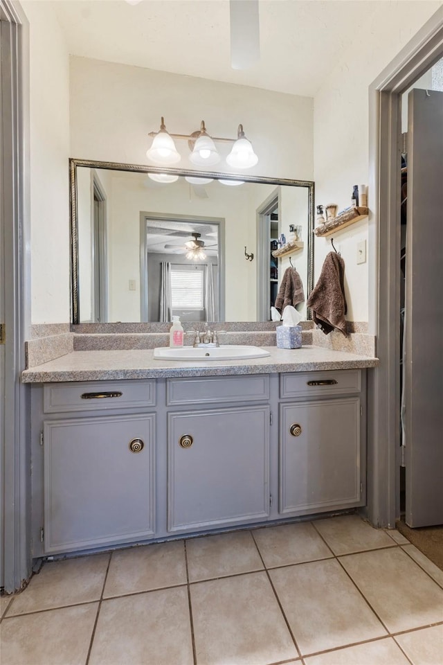 5 Scott Pl, Abilene, TX 79601 - bathroom featuring vanity, tile patterned floors, and a ceiling fan