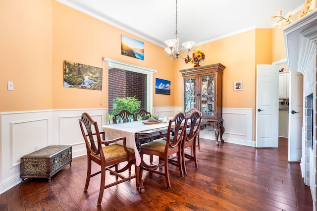 1755 County Road 362, Melissa, TX 75454 - dining area with crown molding, a chandelier, dark wood-style floors, a decorative wall, and a wainscoted wall