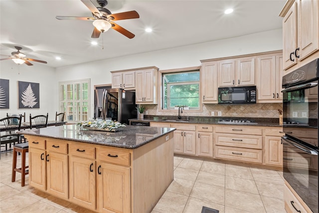 1036 Pvt Rd Unit 8905, Canton, TX 75103 - kitchen featuring black appliances, ceiling fan, light brown cabinets, decorative backsplash, and a sink