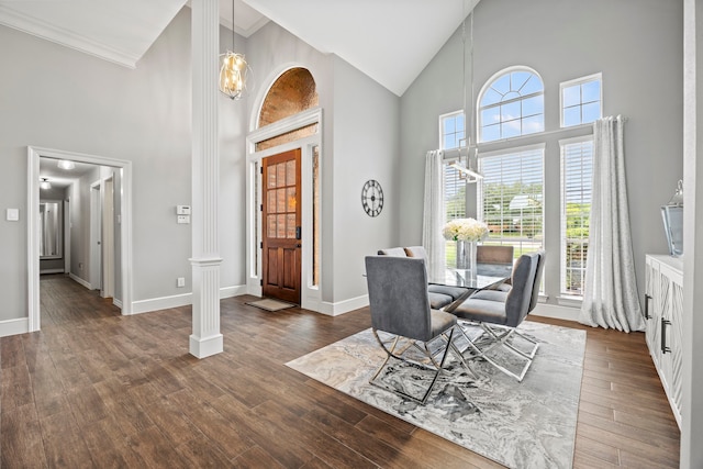 220 Sunray Ln, Sunnyvale, TX 75182 - dining area with high vaulted ceiling, plenty of natural light, dark wood-style floors, baseboards, and ornamental molding