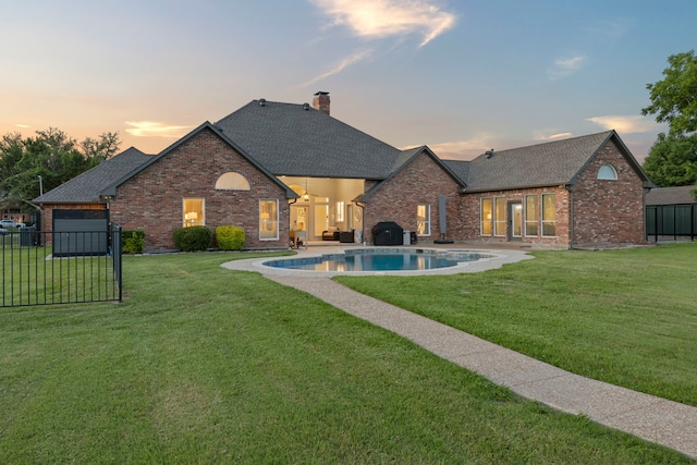 220 Sunray Ln, Sunnyvale, TX 75182 - pool at dusk featuring a patio area