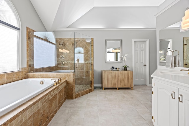 220 Sunray Ln, Sunnyvale, TX 75182 - bathroom with vanity, a bath, a shower stall, tile patterned flooring, and lofted ceiling
