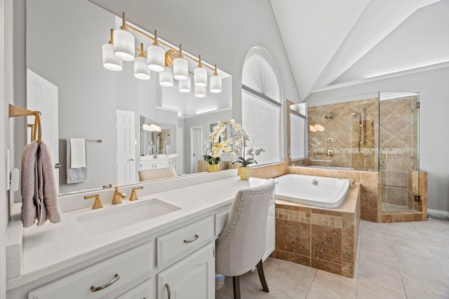 220 Sunray Ln, Sunnyvale, TX 75182 - full bath featuring a garden tub, vanity, a shower stall, tile patterned flooring, and high vaulted ceiling