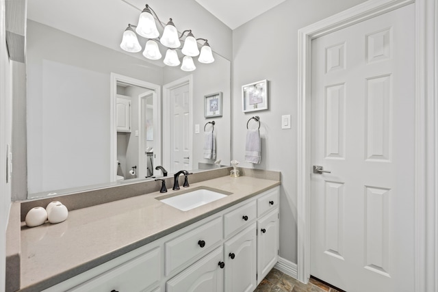 220 Sunray Ln, Sunnyvale, TX 75182 - bathroom with vanity, toilet, and baseboards