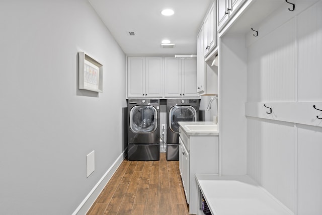 220 Sunray Ln, Sunnyvale, TX 75182 - washroom with separate washer and dryer, dark wood-style flooring, cabinet space, baseboards, and recessed lighting