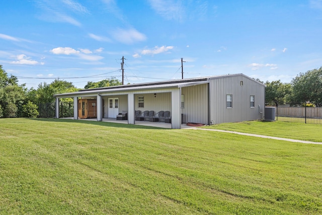 220 Sunray Ln, Sunnyvale, TX 75182 - back of property featuring a patio, cooling unit, and an outdoor hangout area