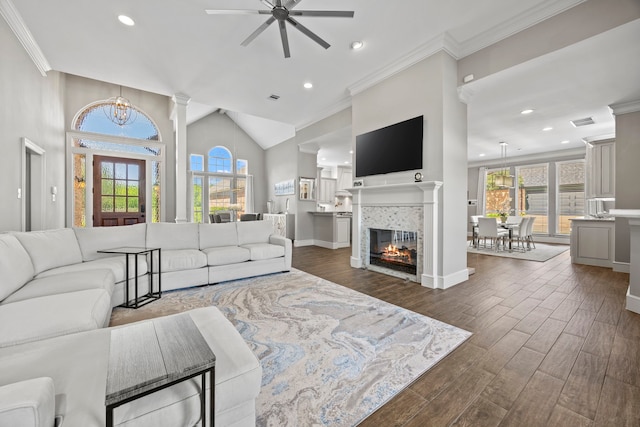 220 Sunray Ln, Sunnyvale, TX 75182 - living area with plenty of natural light, dark wood-type flooring, a ceiling fan, a chandelier, and ornamental molding