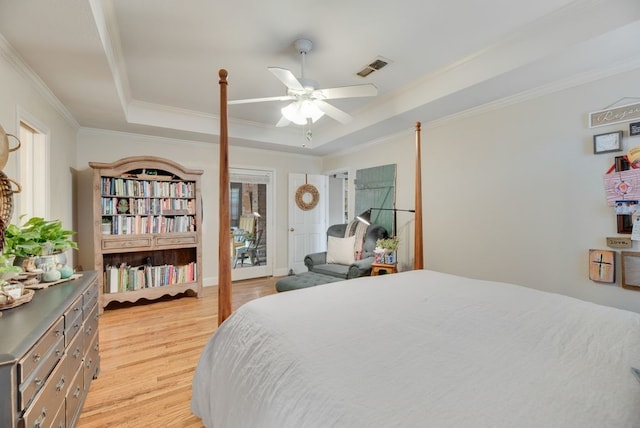 233 Shields Dr, Trophy Club, TX 76262 - bedroom with a raised ceiling, crown molding, light wood-style floors, and ceiling fan