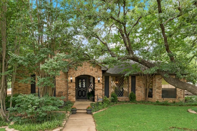 233 Shields Dr, Trophy Club, TX 76262 - view of front of property featuring brick siding and a front lawn