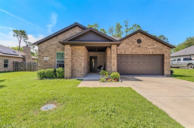 101 Pinkston St, Terrell, TX 75160 - view of front of home with brick siding, a garage, and driveway