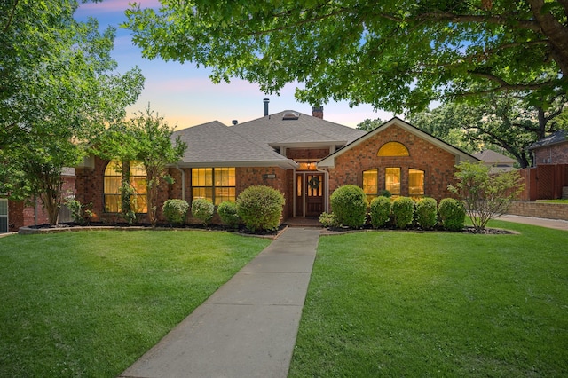 3907 Meadow Dr, Grapevine, TX 76051 - view of front of home featuring brick siding, a chimney, and a shingled roof