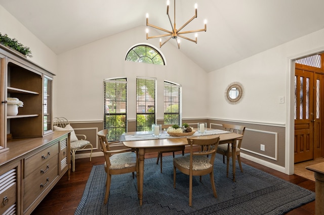 3907 Meadow Dr, Grapevine, TX 76051 - dining space with a wainscoted wall, dark wood-style flooring, a chandelier, and high vaulted ceiling