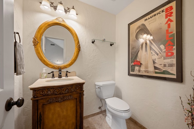 3907 Meadow Dr, Grapevine, TX 76051 - bathroom with vanity, toilet, baseboards, and tile patterned floors