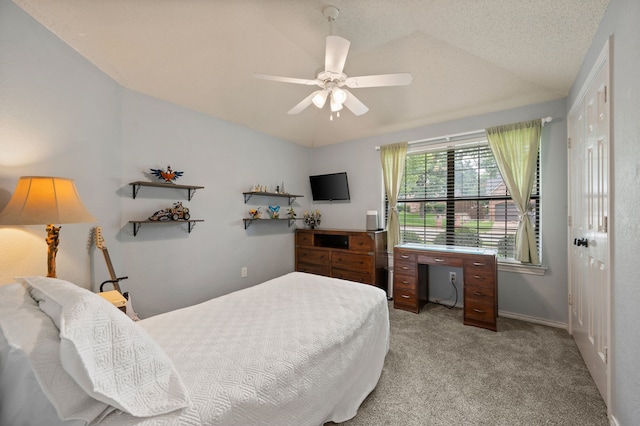 3907 Meadow Dr, Grapevine, TX 76051 - carpeted bedroom with vaulted ceiling, a ceiling fan, and baseboards