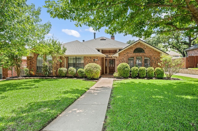 3907 Meadow Dr, Grapevine, TX 76051 - view of front of home with brick siding, a chimney, and roof with shingles